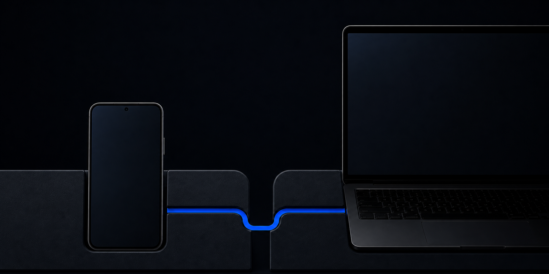 A phone and laptop connected by a single cobalt route on a dark transfer stage.